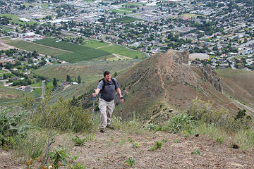 Dave A coming up to Chopper Peak, Castle Rock seen below.
