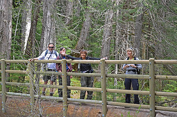 Happy hikers on Dungeness foot bridge