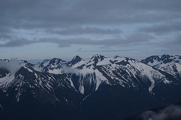 Looking SE at Mt Rainier rising between Buckhorn Mt summits from the saddle NW of Greywolf summit