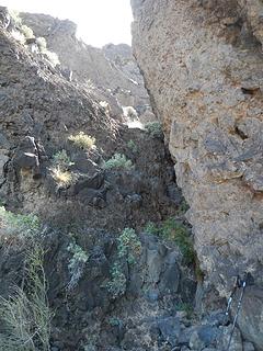 looking back at the crux dryfall (trekking poles for scale)