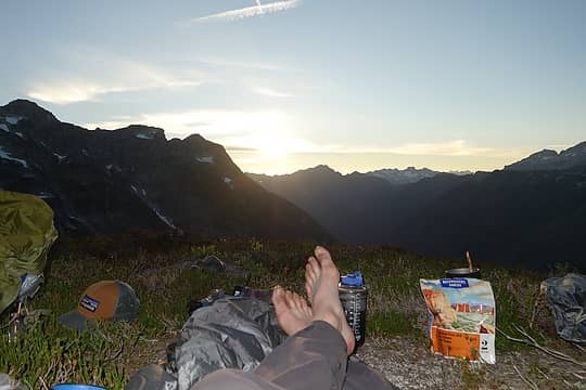 Enjoying a cocktail at sunset from our luxurious bivy. Apologies for the gross feet.