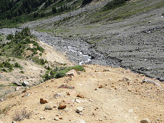 Views from trail above Glacier Basin down steep dusty ridge.