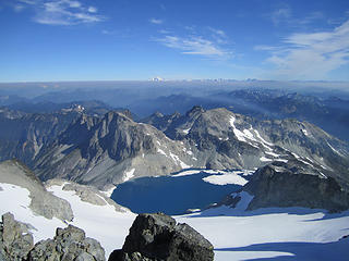 View from summit, looking north at Glacier Peak. Lynch Glacier and it's lake in the foreground.