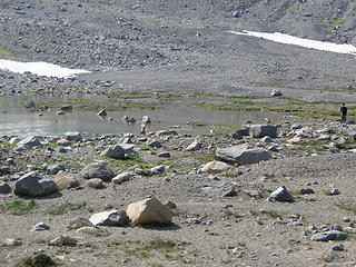 People wading in one of the tarns.