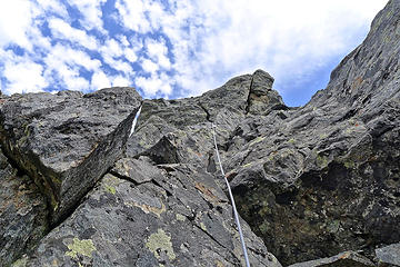 Bessemer summit block. Martin is hidden on a ledge where the rope dissapears