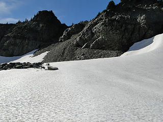 Another snowfield to cross on trail down from Knapsack Pass.