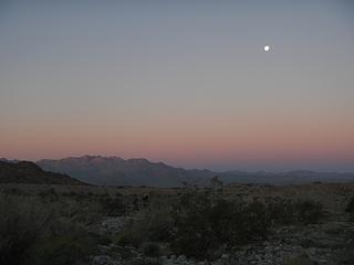 Coxcomb Mountains and moon before dawn