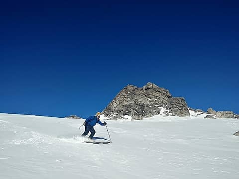 Skiing down from the summit