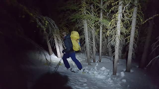 Bushwhack skiing back down in the dark