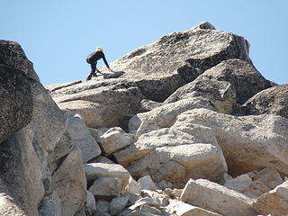 Veronica climbing the last few feet to Cannon's summit