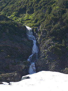 Waterfall plunging down Mount Queets