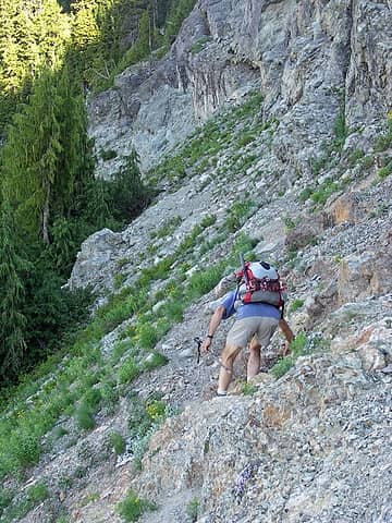 Steve negotiating a loose scree section of the climbers trail.