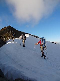 Heading up the snow arete toward the false summit