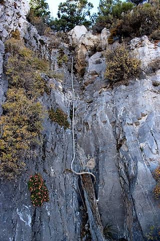 rope going up cliff