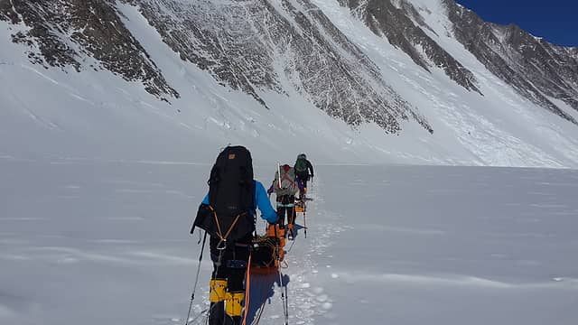 Group heading down Branscomb Glacier, with sleds in tow. Photo by Ossy.