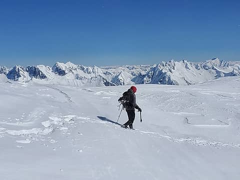 Eric departing the summit, framed between the Northern and Southern Pickets