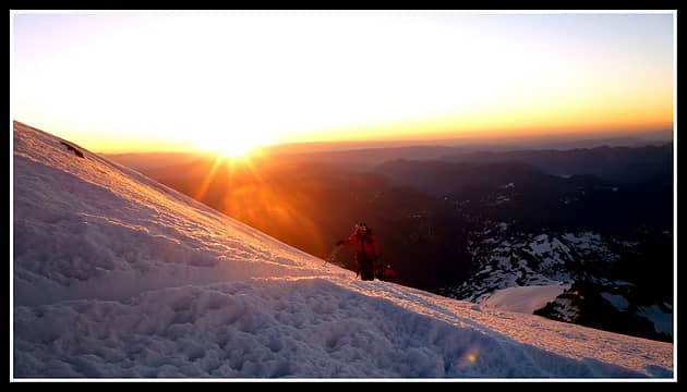 Climbers approaching the summit rim - Sunrise