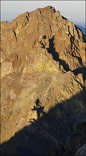 Shadows in the center of the picture reveal the gully system that breaches the upper cliffs.