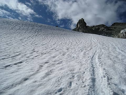glissade down snowfield from ridge