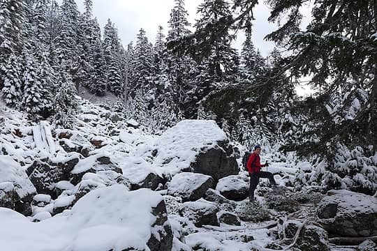 Snow talus provides a welcome break from the blueberry and alder bushwhacking