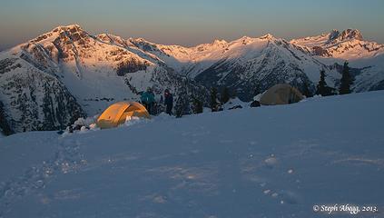 Morning alpenglow on camp and the Southern Pickets.