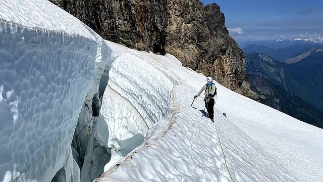 Eyeing the crevasse on the upper slope of the glacier