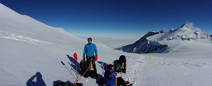 Group takes break on approach to High Camp. Mt. Shinn in background. Photo by Ossy.