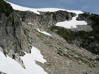 Looking back at the first snowfield and talus basin.