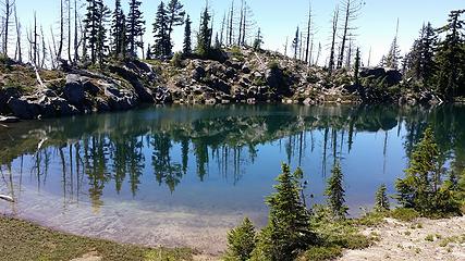 Crystal Lake at 6300' and tree line. Views of Adams, Rainier, St Helens, and Goat Rocks