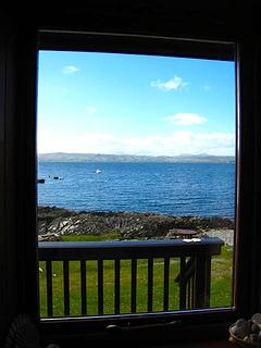 We can see southern Skye straight across the water from our room. Stags would munch on the grass in the eveing. Bliss