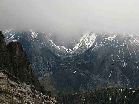 The fog began to lift, giving just enough low clarity to get a glimpse of Colchuck Lake to the south