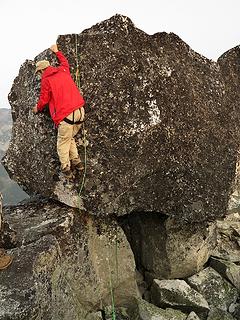 Awkward move on the summit boulder