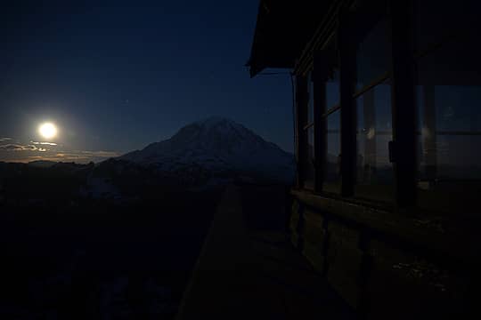 The supermoon rising over the summit of Mt Rainier from Tolmie Peak fire tower at 10PM