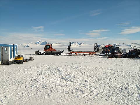 Snowcat in position to haul baggage to blue-ice runway.