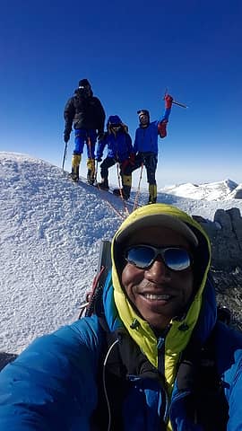 Selfie of Ossy, with group on summit. Photo by Ossy.