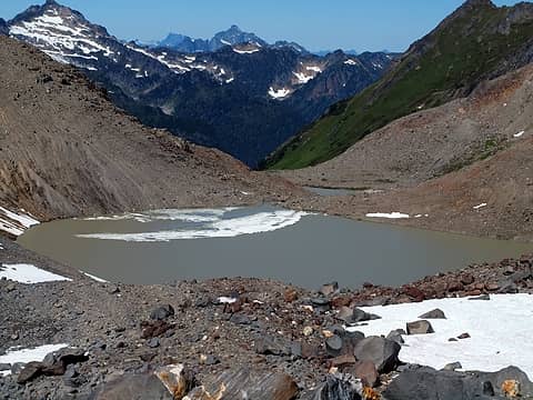 multicolored lake at base of former whitechuck glacier