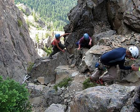 scrambling on the side of cathedral rock's gully