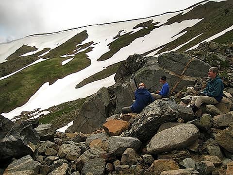 Break at the base of the the snow and rock gullies.