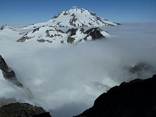 Glacier Peak sits watch above the clouds.