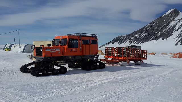Snow cat hauling precious fuel at Union Glacier field camp. Photo by Ossy.