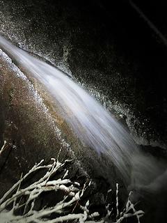 Nighttime waterfall on a slab