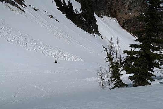 Riley snowboarding below Easy Pass