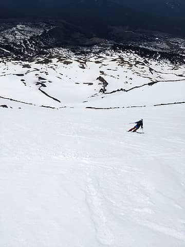 Chris skiing down SW Chutes