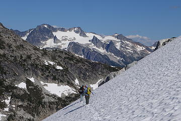 Steepish, firm snow required care. Rounding the corner to the Klawatti Glacier, Logan in the background.