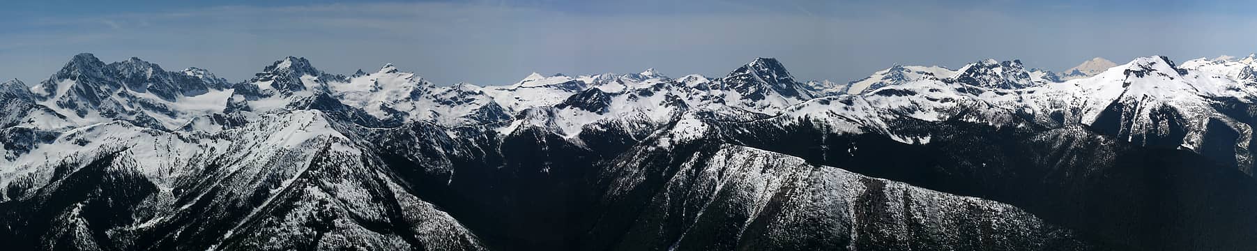 90 degree pan looking west: Ragged Ridge, Icecap Traverse. & Gabriel/Elija group
