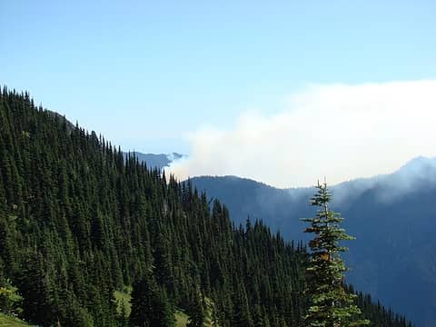 After reaching Constance Pass, we were surprised to see smoke spreading westward across the mountains. It originated from a human caused forest fire (we later learned) in the Duckabush River drainage.