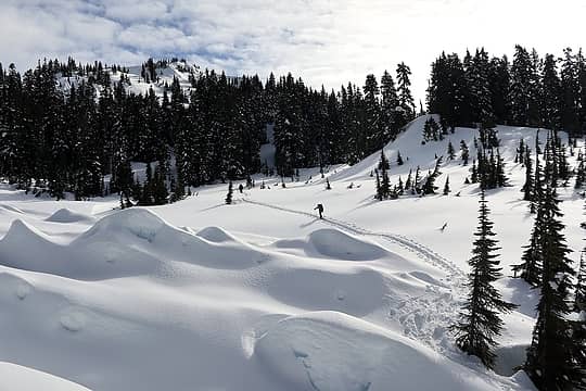 Hiking across the basin, past debris from earlier avalanches