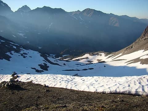 Looking down into upper Heather Creek Basin. Hard to believe it's September.  There is almost 1,000 vf of continuous snow from the ridge line to the melted out meadows below.