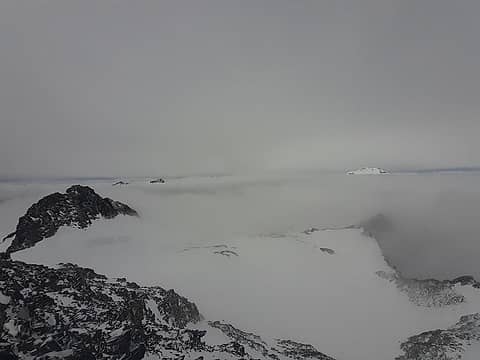 The view opening briefly below me looking towards Glacier Peak