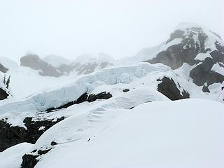 Icefall and cornices fading into the clouds